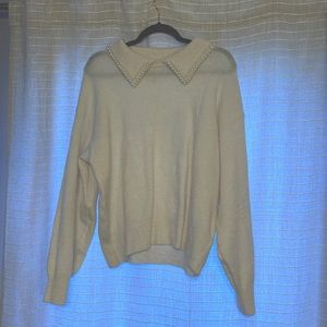 Beige sweater with pearled collar